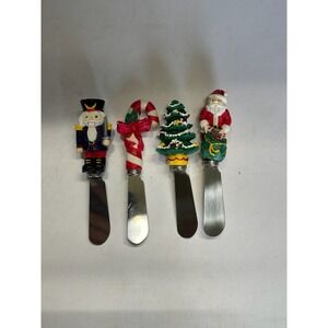 Set of 4 Christmas Spreaders: Nutcracker Santa Tree Candy Cane Stainless Knives